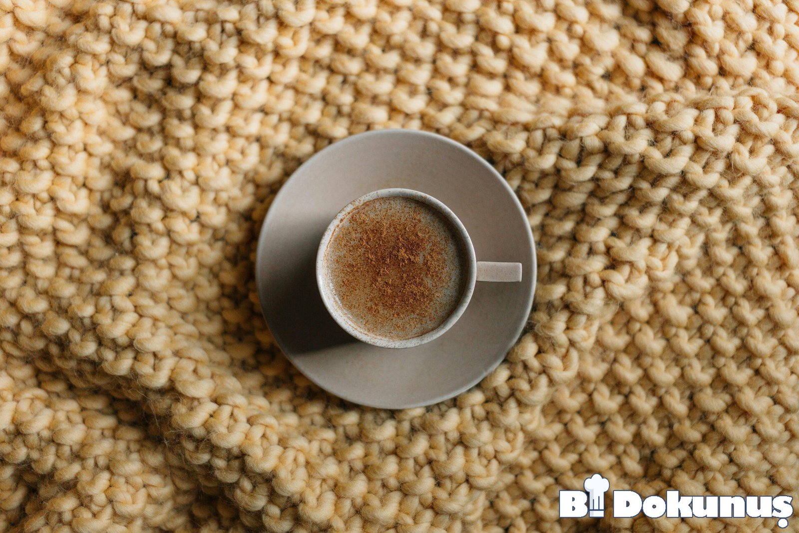 gray ceramic mug on saucer